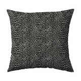 Close up of Dalyn Machine Akina AK2 Midnight Washable Area Rug with a black and gray leopard print pattern.