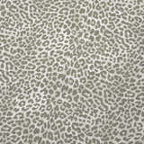 Close-up of Dalyn Machine Akina AK2 Stone Washable Area Rug; chestnut and ivory leopard print pattern.