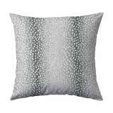 Close-up of a square pillow with a gray and white spotted pattern, resembling the Dalyn Akina AK3 Flannel rug design.
