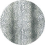 Close-up of the round Dalyn Machine Akina AK3 Ivory Washable Area Rug, featuring a black spotted pattern on an ivory background.