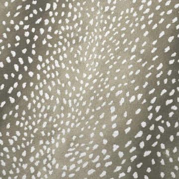 Close-up of Dalyn Akina Stone Washable Area Rug. Chestnut rug with ivory, abstract spot pattern. Casual style.