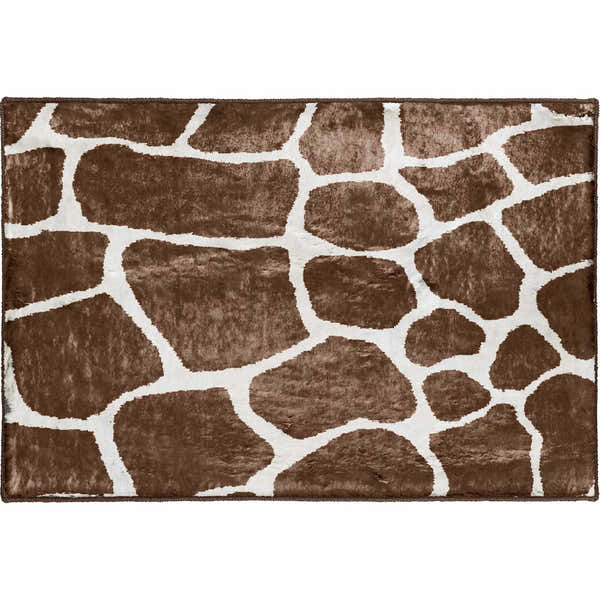 Close-up of the Dalyn Machine Akina AK4 Chocolate Washable Area Rug with a brown and white animal print pattern.