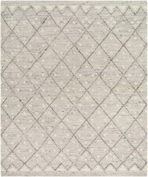 Close-up of the hand woven Aliaga Area Rug. Cream wool rug with a geometric diamond pattern in gray and charcoal. Design-Rectangle-810