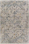 Close-up of the Anmoore Luxe Rug. Machine-woven polyester with a traditional Persian-style design in charcoal, cream, and mustard. Design-Rectangle-6796