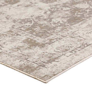 Close-up of the Dalyn Antalya AY2 Taupe Area Rug, showcasing its traditional design, taupe and ivory colors, and soft texture.