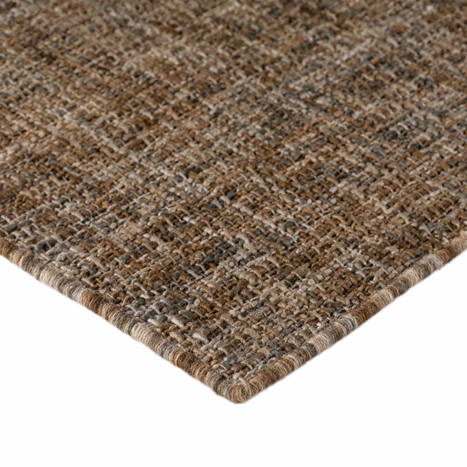 Close-up of the hand-loomed Dalyn Abruzzo AZ1 Chocolate Area Rug. Brown, chestnut, ivory, and taupe wool and cotton texture.