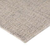 Close-up of the hand-loomed Dalyn Abruzzo AZ1 Ivory Area Rug, showing beige, chestnut, and light gray tones and wool texture.