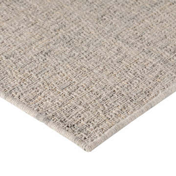Close-up of the hand-loomed Dalyn Abruzzo AZ1 Ivory Area Rug, showing beige, chestnut, and light gray tones and wool texture.