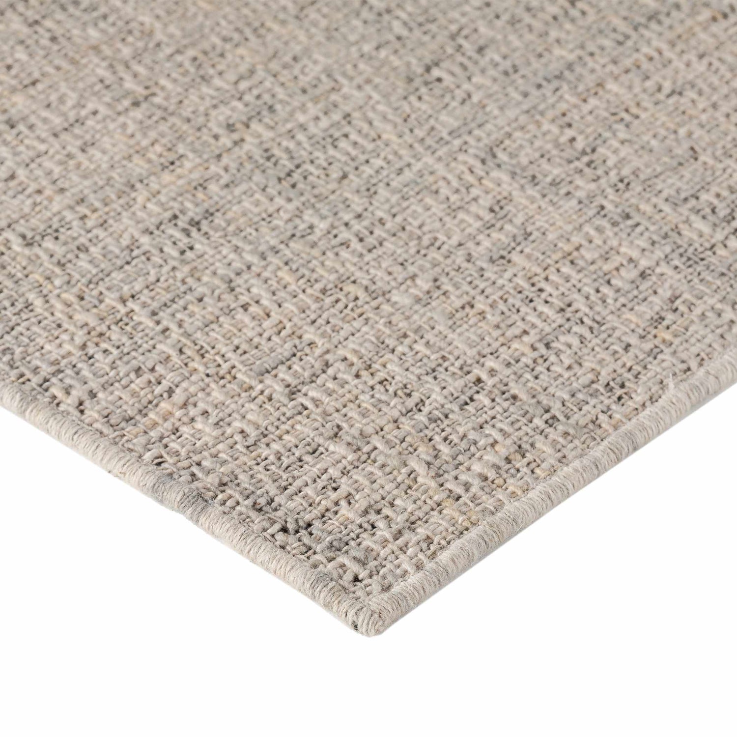 Close-up of the hand-loomed Dalyn Abruzzo AZ1 Ivory Area Rug, showing beige, chestnut, and light gray tones and wool texture.