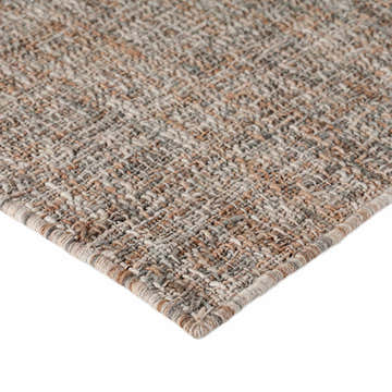 Close-up of the hand-loomed Dalyn Abruzzo AZ1 Putty Area Rug showing beige, brown, and gray woven texture.