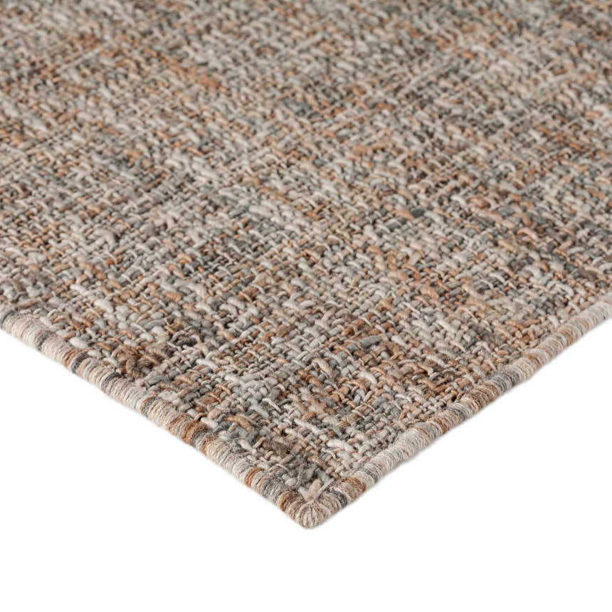 Close-up of the hand-loomed Dalyn Abruzzo AZ1 Putty Area Rug showing beige, brown, and gray woven texture.