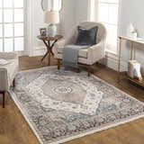 Living room scene with a cream chair and the traditional Baychester Area Rug in cream, denim, and brown tones. Roomscene-Rectangle