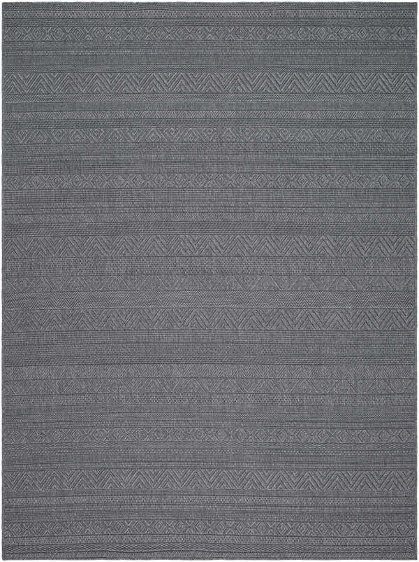 Close-up of the Brayan Area Rug, a gray rug with a woven geometric pattern. Farmhouse style. Design-Rectangle-537