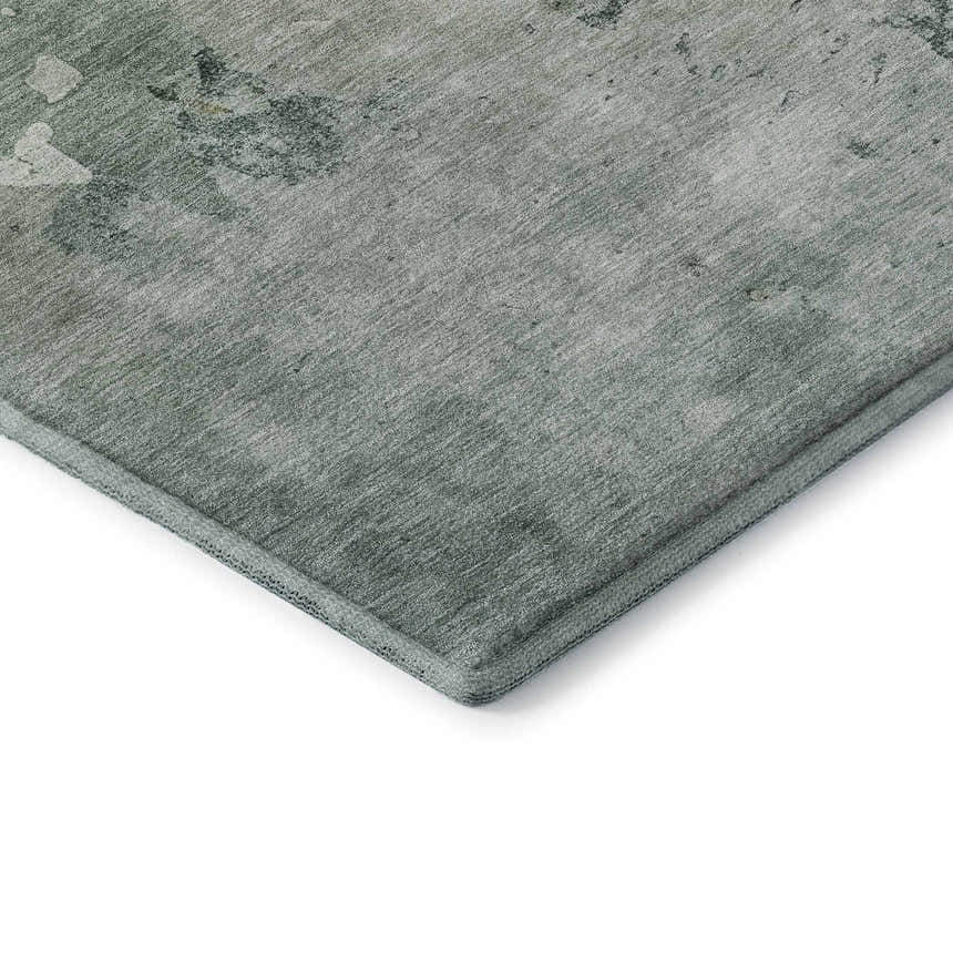 Close-up of the Dalyn Luxury Bresca BC1 Seafoam Washable Area Rug, showing its subtle aloe and sage abstract pattern.
