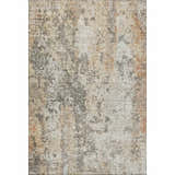 Close-up of the Dalyn Luxury Bresca BC5 Terracotta Washable Area Rug. Beige, burnt orange, and dark brown distressed pattern.