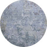 Close-up of a round Dalyn Luxury Bresca BC6 Blue Washable Area Rug with a distressed denim, light blue, and gray pattern.