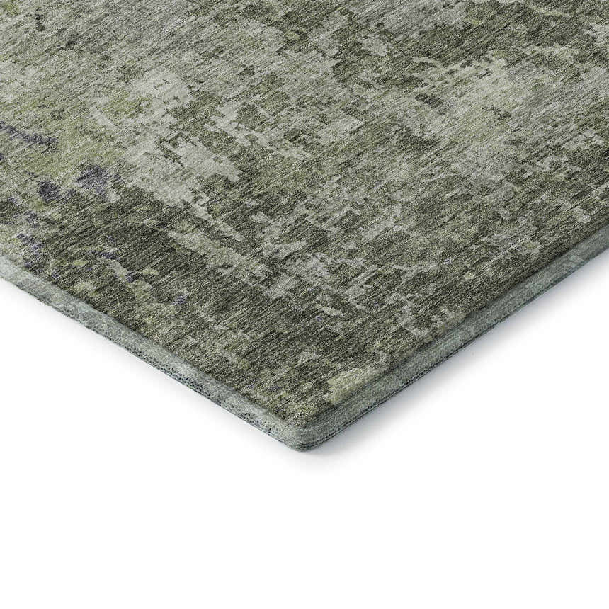 Close-up of the Dalyn Luxury Indoor/Outdoor Bresca BC6 Green Washable Area Rug, showing its aloe, sage, and charcoal pattern.