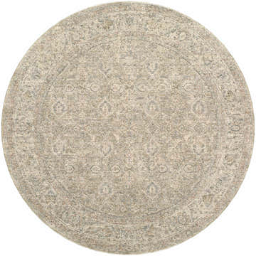 Close-up of the round Buddug Tan Area Rug. Traditional farmhouse style with cream, tan, green, and slate blue colors. Design-Round-53