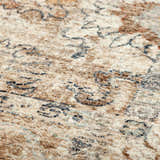 Close-up of the Dalyn Bergama BE4 Ivory Area Rug showing beige, chestnut, blue, and paprika colors.
