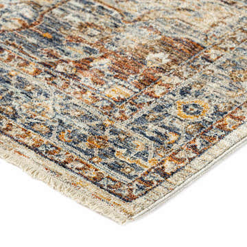 Close up of the traditional Dalyn Bergama BE9 Spice Area Rug showing brown, navy, and paprika colors.