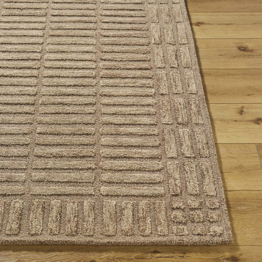 Close-up of the beige Birger Area Rug showing its hand-tufted texture and contemporary rectangular pattern. Front
