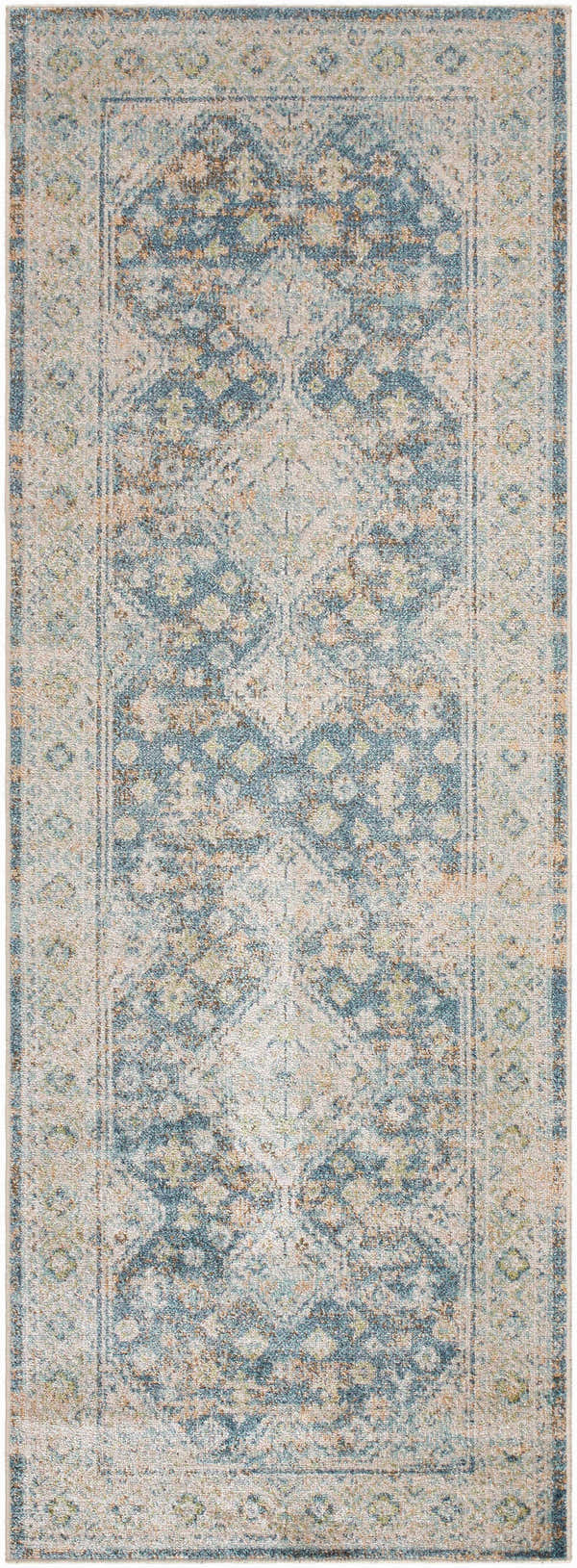 Close-up of the Bhavya Navy Washable Area Rug featuring a traditional, distressed diamond pattern in navy, brown, and beige. Design-Runner-2773