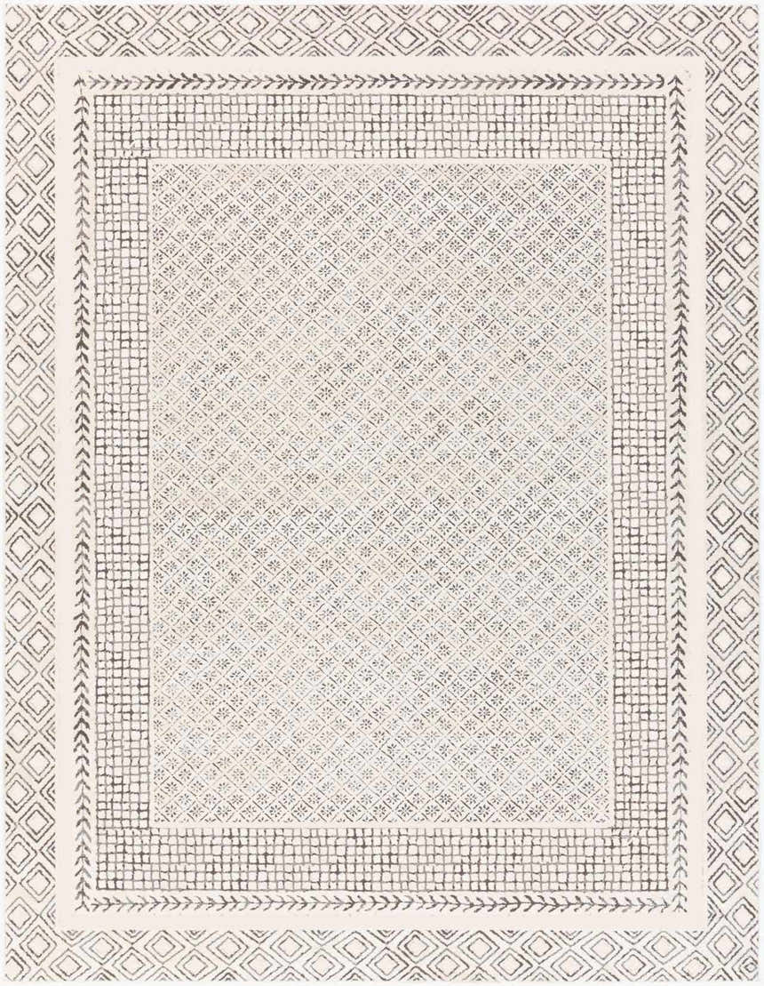 Close-up of the New Burdette Area Rug. Charcoal geometric pattern on off-white. Farmhouse style, machine woven texture. Design-Rectangle