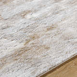 Close-up of the ivory and tan Bridie Luxe Thick Area Rug showing its plush texture and subtle contemporary pattern. Texture