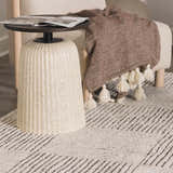 Close-up of the Modern Scandi High Pile Architect I Area Rug in ivory and black with geometric line pattern. Styleshot