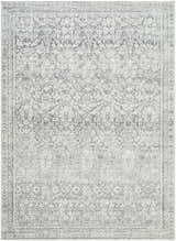 Close-up of Collins Avenue GACA-2303 rug. Machine-woven polyester rug in charcoal, cream, gray, and light gray with traditional pattern. Design-Rectangle-57