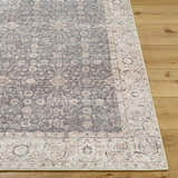 Close-up of the Spokane Machine Woven PNWSP-2306 area rug. Traditional design with charcoal, ivory, and tan colors. Front