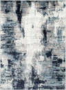 Close-up of the Baldwyn Area Rug featuring a contemporary abstract design in black, charcoal, blue, teal, and white. Design-Rectangle-537