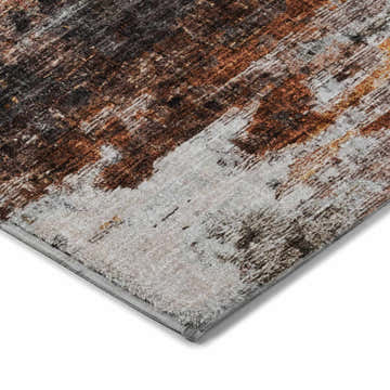 Close-up of the Dalyn Luxury Boca BO10 Gray Washable Area Rug, featuring caramel, paprika, and silver gray tones.