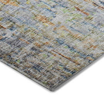 Close-up of the Dalyn Luxury Boca BO13 Putty Washable Area Rug. Features beige, caramel, denim, and paprika hues.