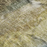 Close-up of the Dalyn Luxury Boca BO4 Khaki Washable Area Rug featuring beige, gold, and light brown tones.