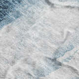 Close-up of the Dalyn Luxury Boca BO7 Denim Washable Area Rug, featuring a denim and white casual design.