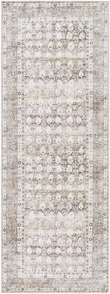 Close-up of the Bartek Washable Area Rug. Machine-woven polyester rug in off-white and navy with a traditional, distressed pattern. Design-Runner-2773