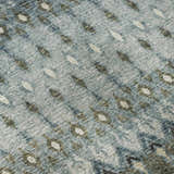 Close-up of Dalyn Brisbane BR1 Mineral Blue Washable Area Rug. Features blue, olive, and taupe diamond pattern.