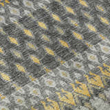 Close-up of Dalyn Brisbane BR1 Pewter Washable Area Rug. Gold, gray, and taupe casual rug with a geometric pattern.