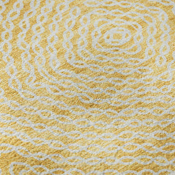 Close-up of Dalyn Brisbane BR3 Gold Washable Area Rug featuring a textured beige and gold geometric pattern.