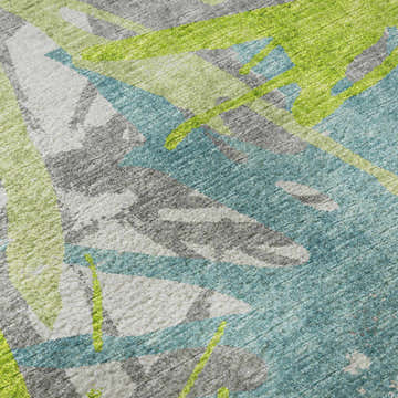 Close-up of Dalyn Brisbane BR6 Pacifica rug. Abstract design in lime green, pacifica blue, taupe, and gray. Washable polyester.