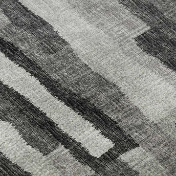 Close-up of Dalyn Brisbane BR7 Midnight Washable Area Rug, featuring beige, midnight, and taupe stripes.