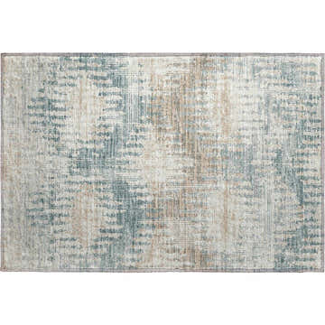 Close-up of the Dalyn Brisbane BR9 Seascape area rug. Beige, light brown, and teal abstract pattern.