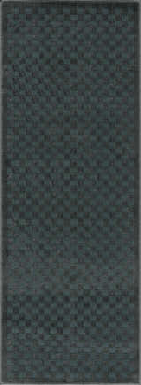 Close-up of the Gaiwan Oil Green Washable Area Rug. Features a textured checkerboard pattern in petrol blue and gray. Design-Runner