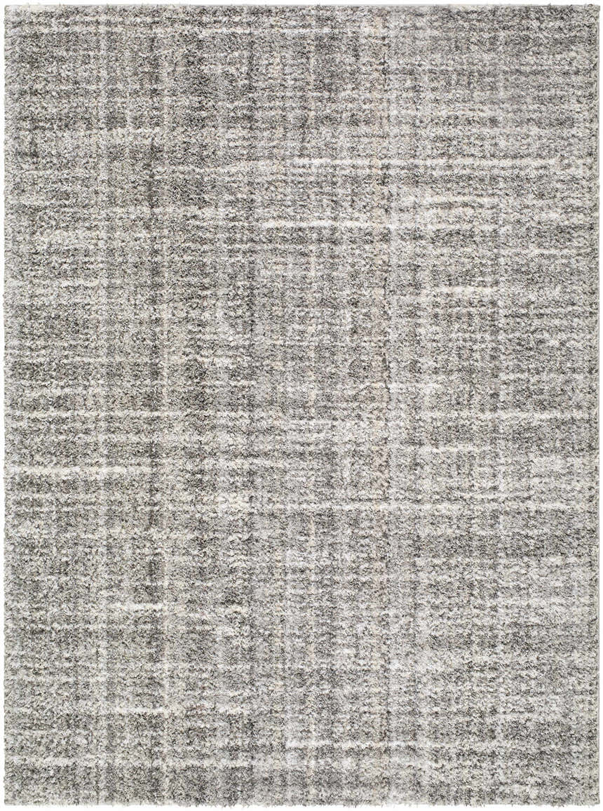 Close-up of the Reyoa Light Gray Area Rug. Machine woven polyester with a subtle, textured grid pattern. Design-Rectangle-537