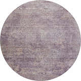 Close-up of round Dalyn Luxury Burano BU10 Plum Washable Area Rug. Purple, chestnut, and light purple floral pattern.