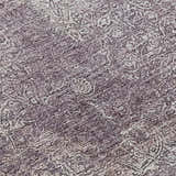 Close-up of Dalyn Luxury Burano BU10 Plum Washable Area Rug. Chestnut, purple tones, farmhouse style, machine-made texture.