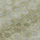 Close-up of the Dalyn Luxury Burano BU6 Aloe Washable Area Rug, showing its green, beige, and silver gray textured pattern.