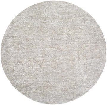 Close-up of a round Beiwen Area Rug. Light sage, light slate, and slate blue hues create a traditional, textured pattern. Design-Round-53