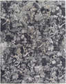Close-up of the Breeda Black Area Rug featuring an abstract floral pattern in black, charcoal, gray, and ivory. Design-Rectangle-710102